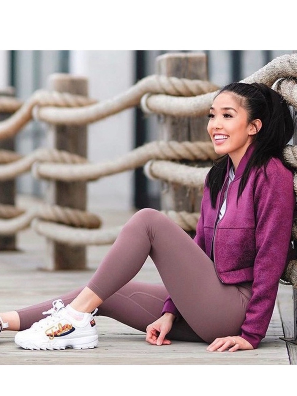 Balance Athletica Flight cropped bomber jacket in a deep plum